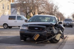 Damaged Vehicle in Street